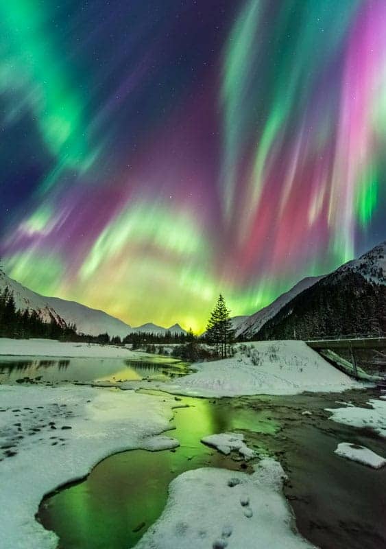 Colorful aurora borealis display near Turnagain Arm, Alaska.