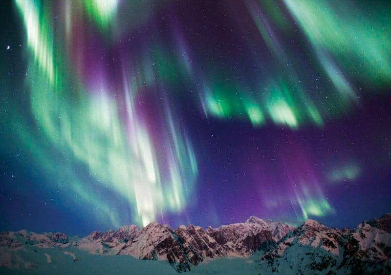 Aurora borealis over Denali and the Alaska Range mountains.